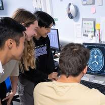 Summer School students using MRI technology