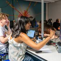 Summer School students in the Phyics lab