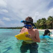 Students hands-on learning in the ocean