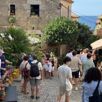 CET Barcelona students walking on cobblestones in an alleyway in Costa Brava