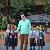 4 young students meeting international Teacher 