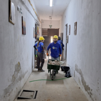 Volunteers working on the construction site of the cultural center.