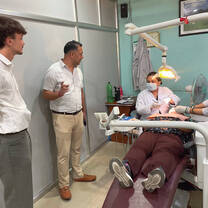 Nepal Dental Interns performing a checkup on a patient