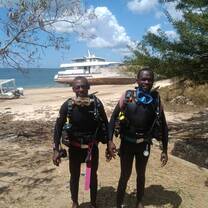 Local dive team members preparing for a conservation dive in Tanzania