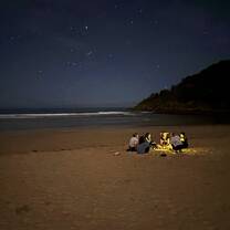 camping at night on a beach
