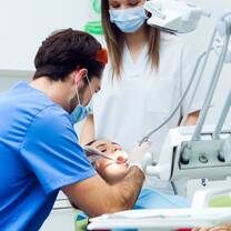 Dentist with patient