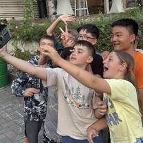 Billy taking pics with kids