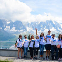 Students posing in front of the Mont Blanc massif, the highest peak in Western Europe