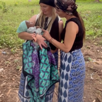 women holding child