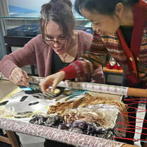 Lingoinn student trying embroidery in Chengdu