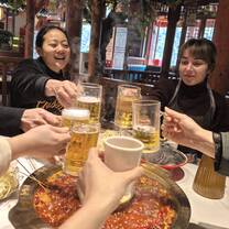 Lingoinn student tasting local food in Chongqing