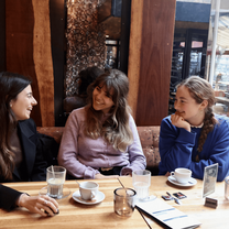 Friends enjoying a cup of coffee