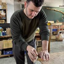 Lingoinn student making wooden music box in Yilan