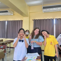 teacher with students in the classroom