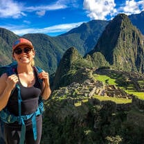 Student poses in front of Machu Picchu.