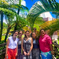 Students pose in front of a Bahai Temple