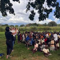 Interacting and playing with school children