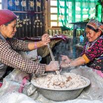 Women in Nepal cooking.
