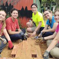 Volunteers in Cambodia building 