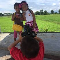Kids testing out the volunteers camera