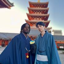 Two students wearing kimonos in front of the Senso-Ji temple