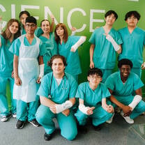 Students practising trauma and emergency care skills during a supervised medical summer school in the UK
