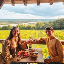 Enjoying at a vineyard restaurant while practicing French during an immersion experience in southwest France