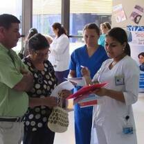nurse helping a couple