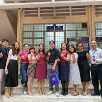 people standing in front of a building