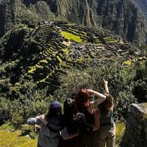 students looking out over Machu Picchu