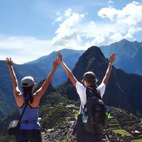 two students posing in front of Machu Picchu