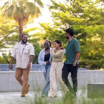 Students walking and chatting in front of the Dubai campus