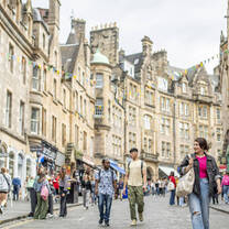 Students exploring Cockburn Street in Edinburgh's old town