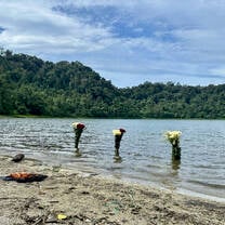 International students discovering the sacred Laguna Chicabal in Guatemala