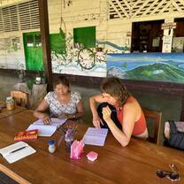 A women studying with local teacher