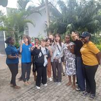 Volunteers with homestay member