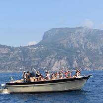 Teen travelers on a boat in the Amalfi Coast