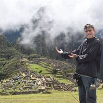 Teen posing in front of Machu Picchu
