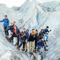 Teen travelers on a galcier in Iceland