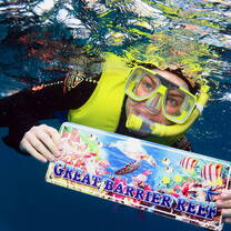 Teen scuba diving the Great Barrier Reef