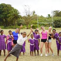 Teens volunteering at a school in Fiji