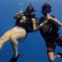 Teens Scuba Diving in Belize
