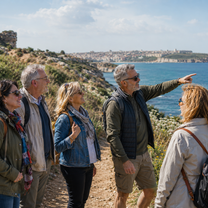 Mature students from International House Malta out on a hike in northern Malta, being led by a guide.