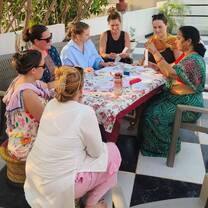 VOLUNTEERS LEARNING HOW TO MAKE REUSABLE MENSTRUAL PADS