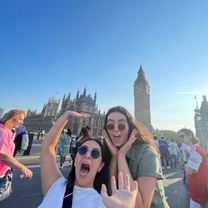 Two women in front of Big Ben in London