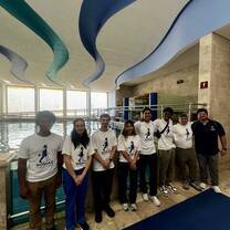 Nomads in front of rehab pool