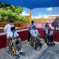 Nomads practicing wheelchair maneuvering