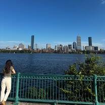 Woman looking out at the NYC skyline
