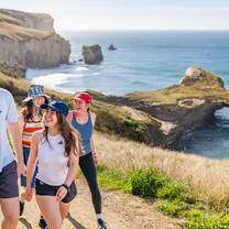 Students at Tunnel Beach, Dunedin