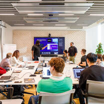 Students presenting in front of class